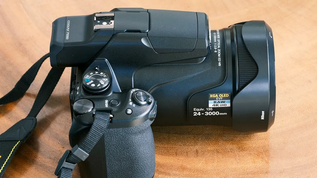 a camera sitting on top of a wooden table