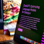 a laptop computer sitting on top of a wooden desk