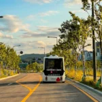 a bus driving down a street