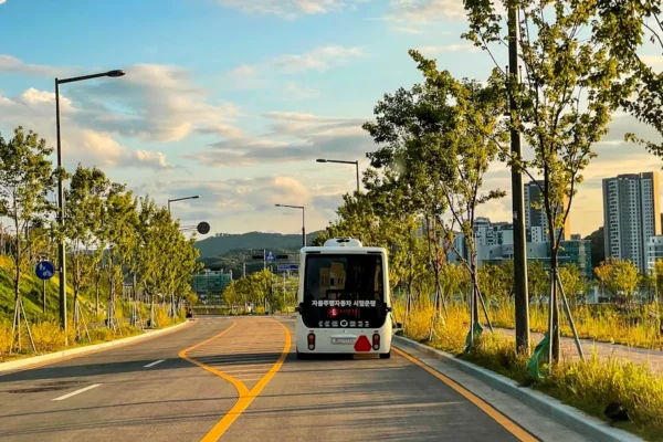 a bus driving down a street