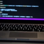 a close up of a laptop computer keyboard