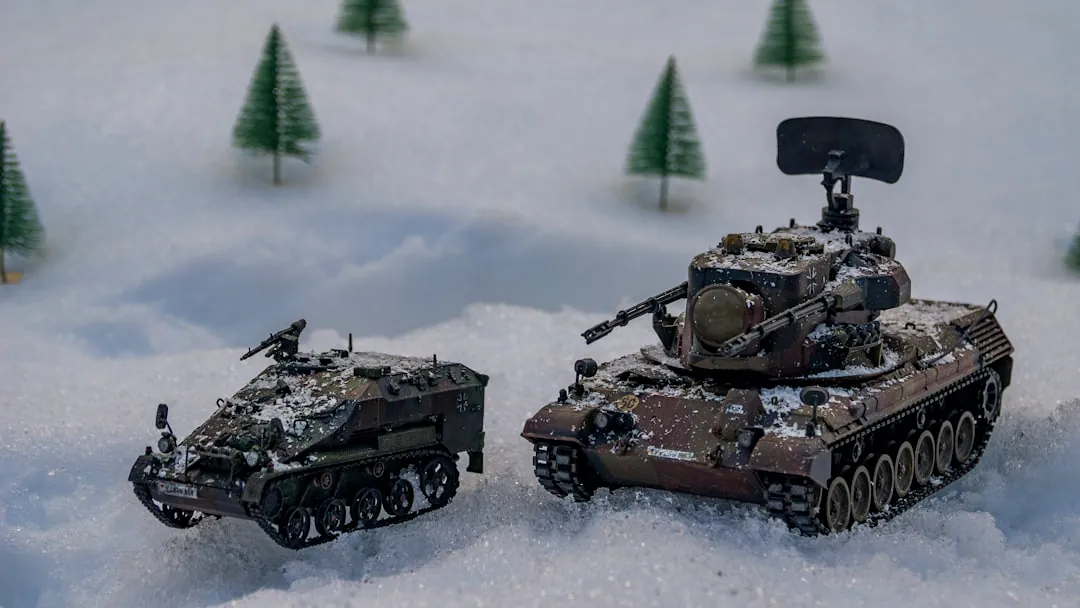 a couple of tanks that are in the snow