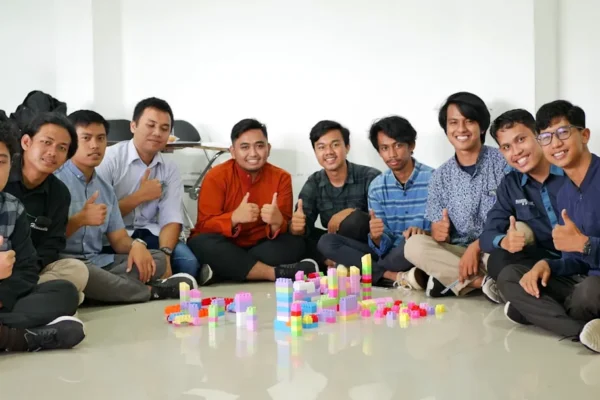 a group of men sitting next to each other