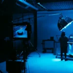 a group of people standing in a dark room