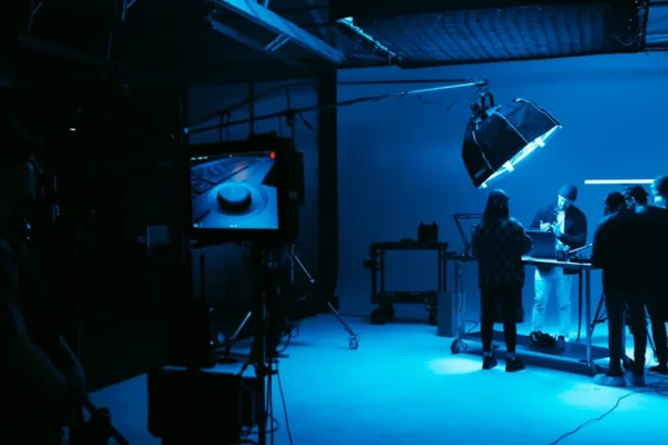 a group of people standing in a dark room