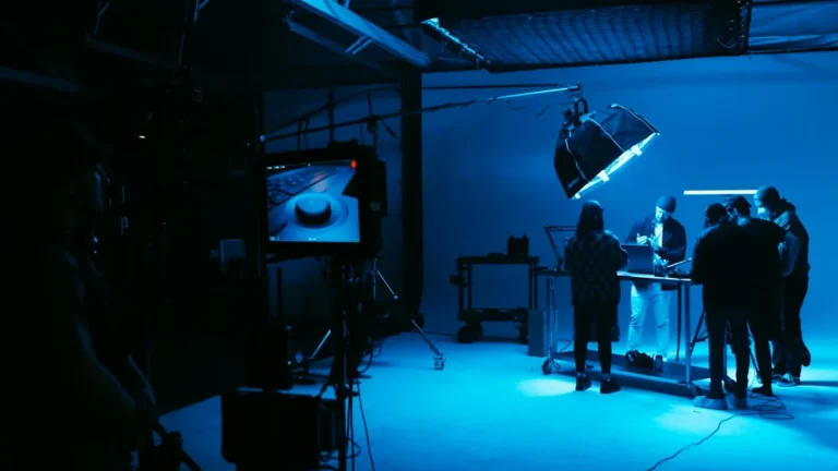 a group of people standing in a dark room