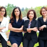 a group of women posing for a photo