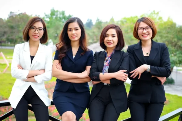 a group of women posing for a photo