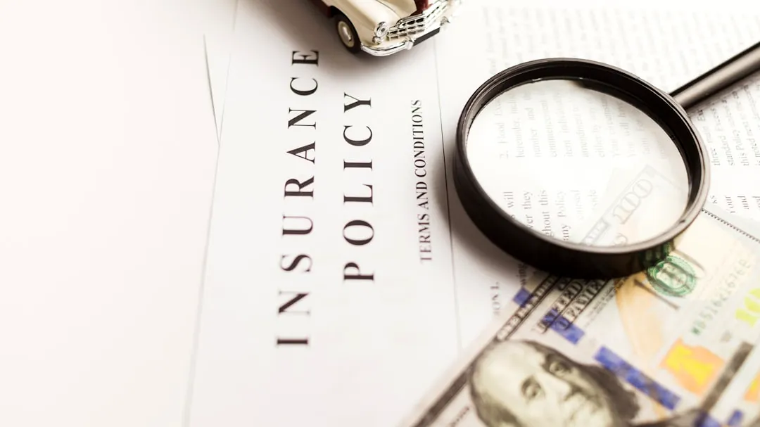 a magnifying glass sitting on top of a piece of paper