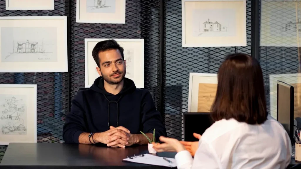 a man and a woman sitting at a table