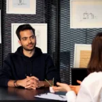 a man and a woman sitting at a table