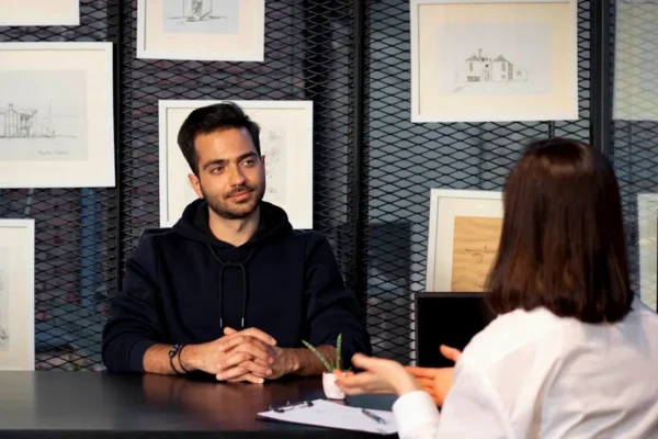 a man and a woman sitting at a table